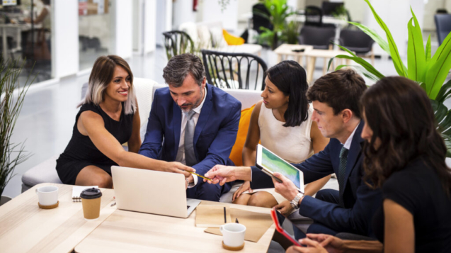 high-angle-coworkers-meeting-office-1024x683
